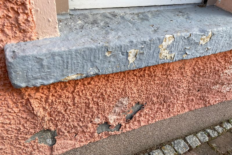 Damp wall plaster damage
